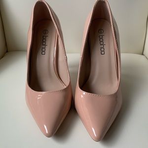 Nude Patent Pumps